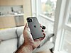 person holding black iphone 7 plus